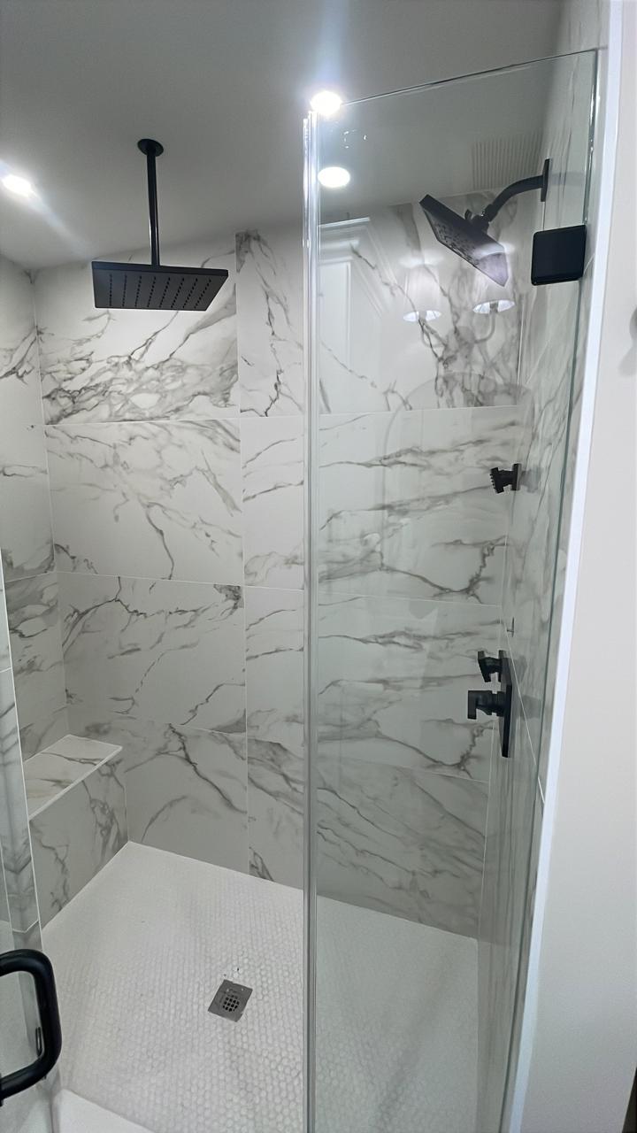 Rain shower and body shower fixtures installed - finished bathroom