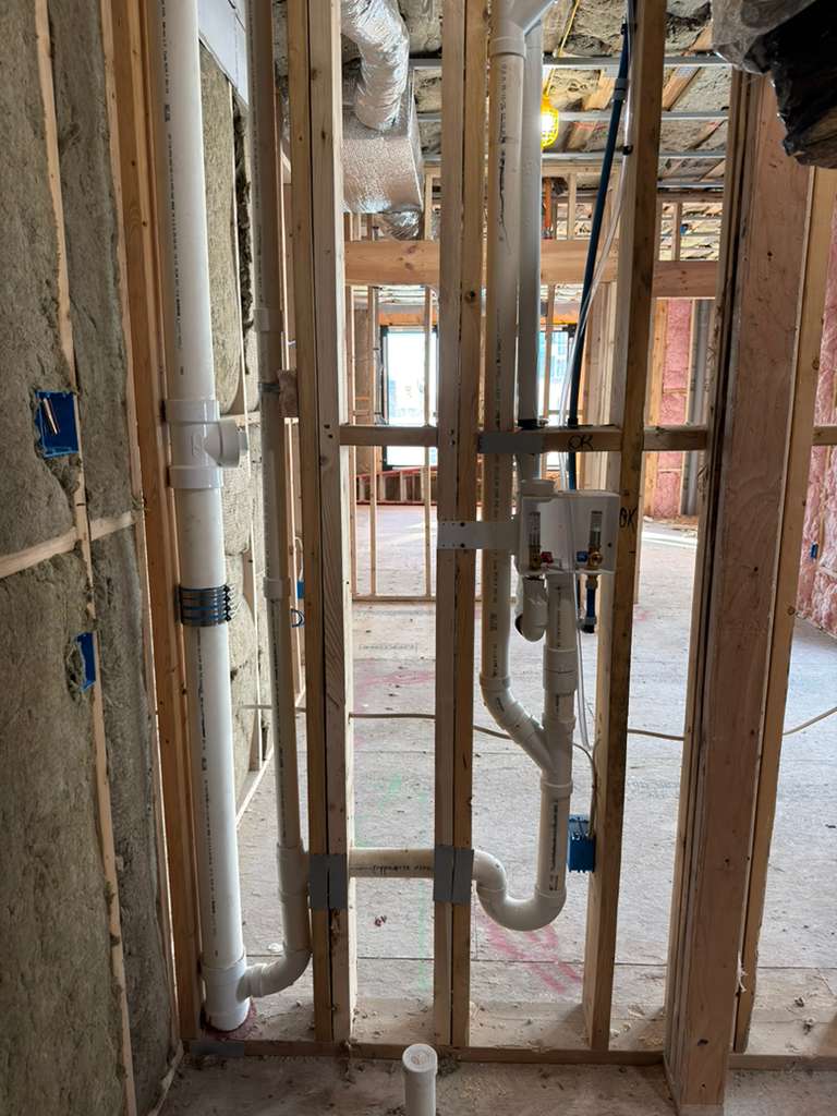 Laundry water lines and drain connection installation