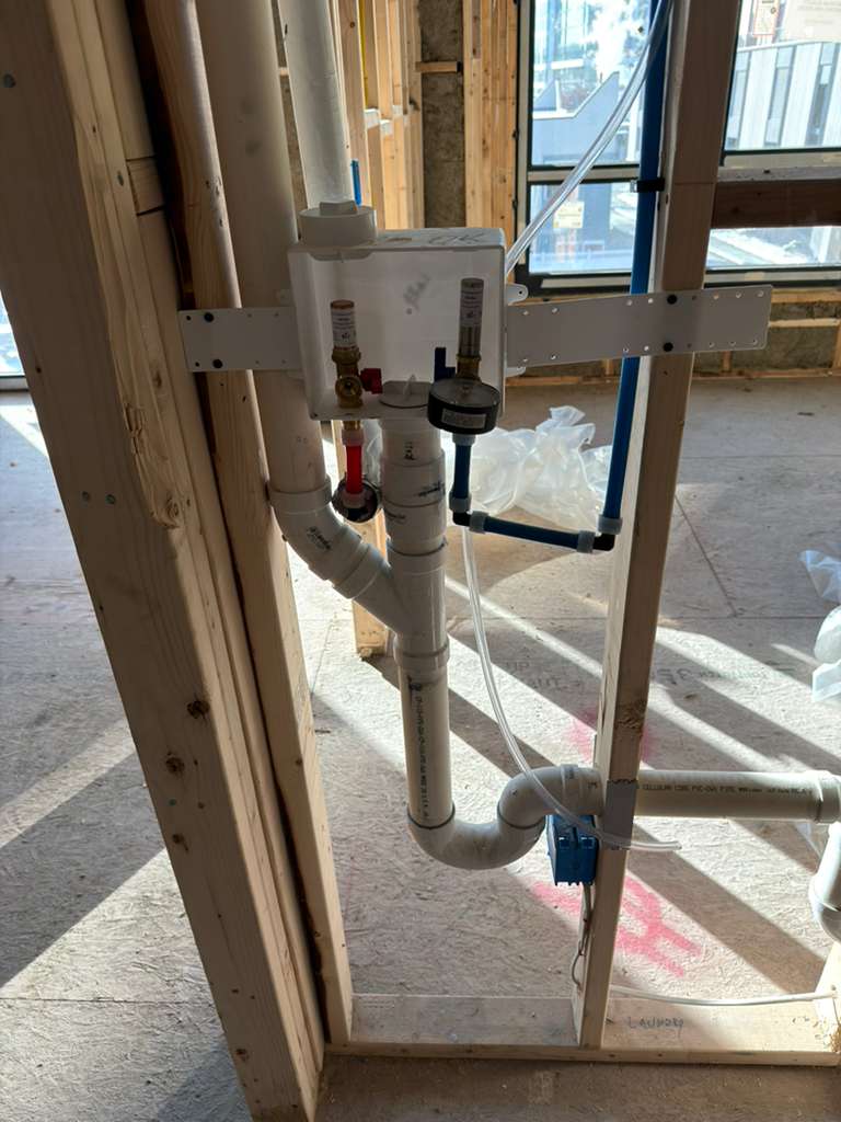Laundry drain and water rough plumbing installation